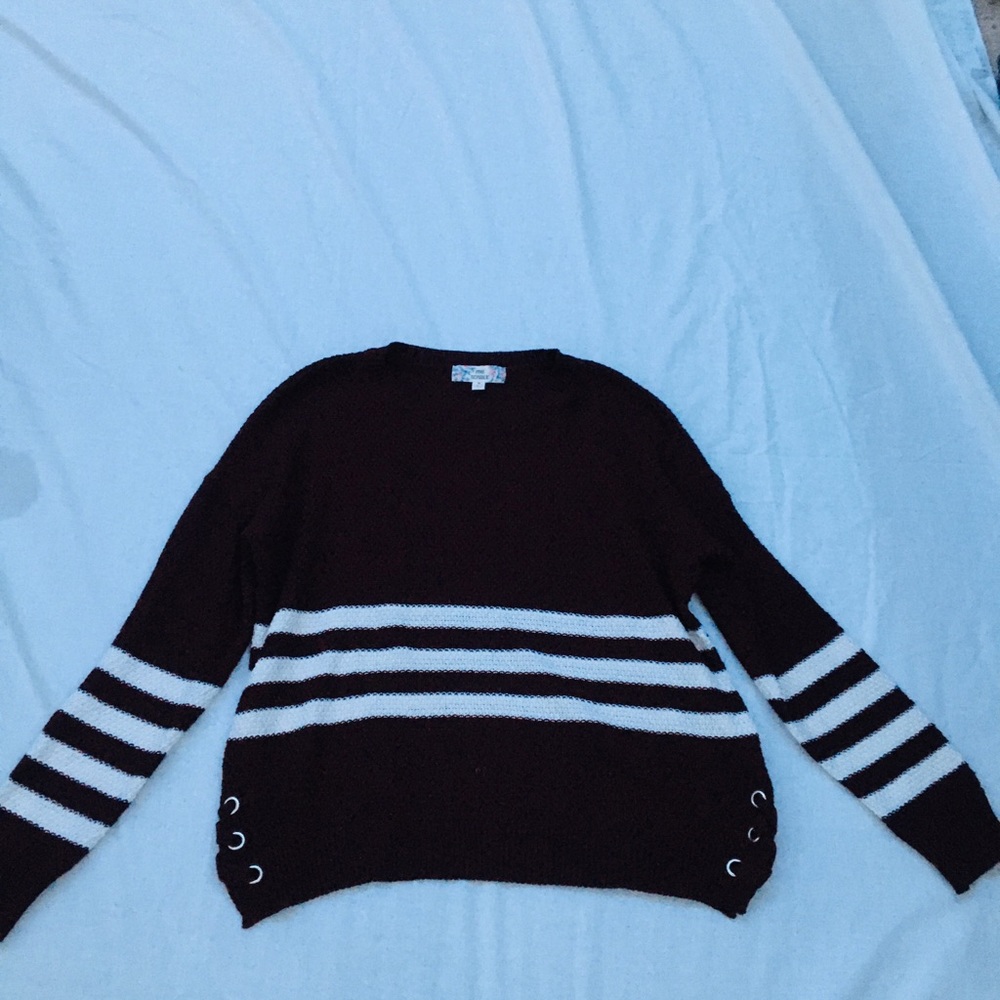 Maroon sweater.